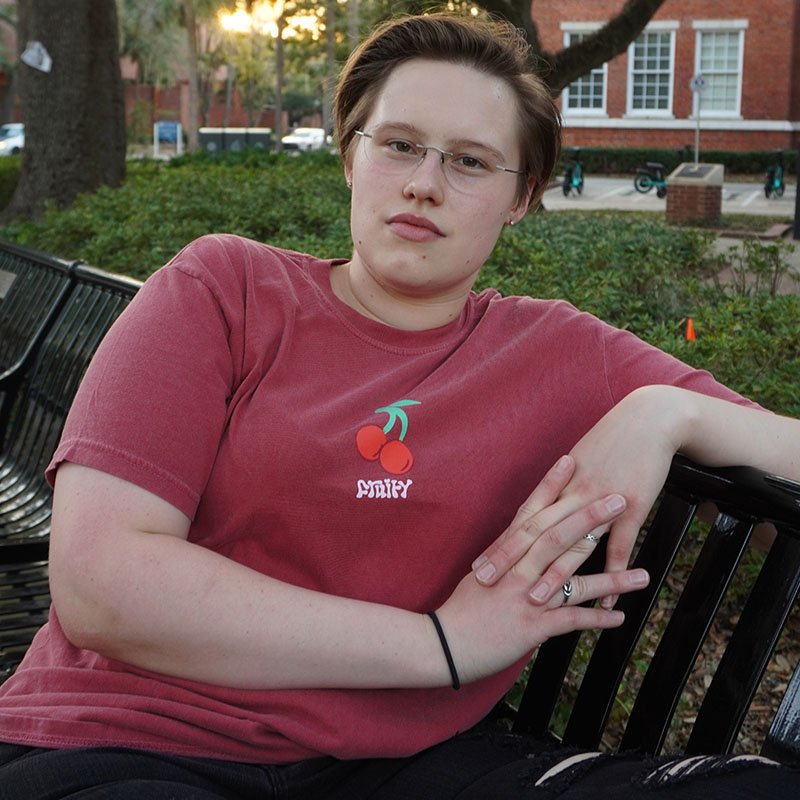 Cherry Fruity Shirt Sit Bench Crimson T-Shirt Subtle Gay Pride Queer Fashion LGBTQ Clothing Inclusive Apparel